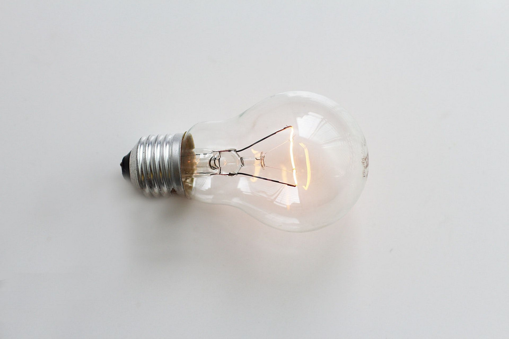 A lightbulb turning on symbolizing the idea to form a new business