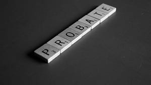 Probate spelled out in tiles. Learn about the different ways an Estate can be probated in Oklahoma.