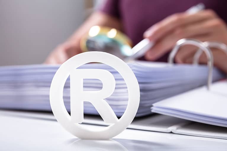 Registered Trademark Symbol. A Trademark Attorney can help with a trademark application and trademark registration.