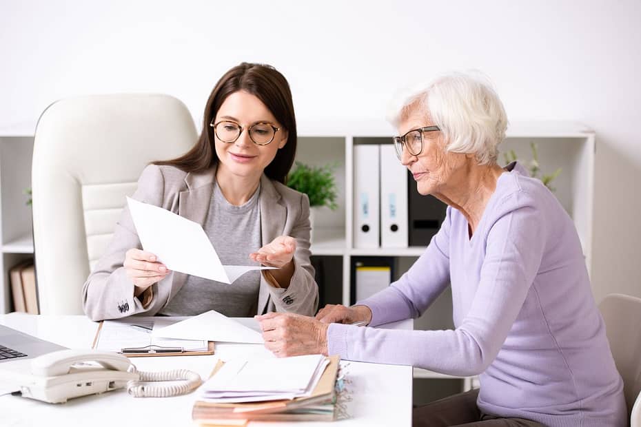 Attorney explaining Estate Planning documents to a senior woman