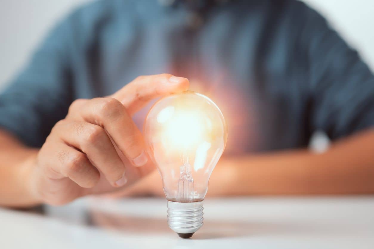 A bright lightbulb representing a new brand idea that should be Trademarked
